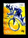 A stamp printed in Australia shows an image of cyclist for Olympics game on value at 45 cent.